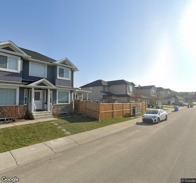 Street view of 303 Saddlecreek Point NE, Calgary