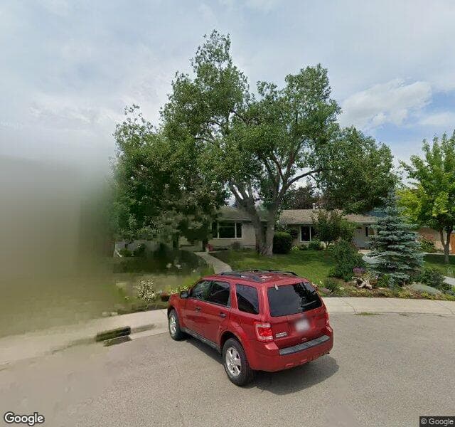 Street view of 728 Lake Twintree Crescent SE, Calgary