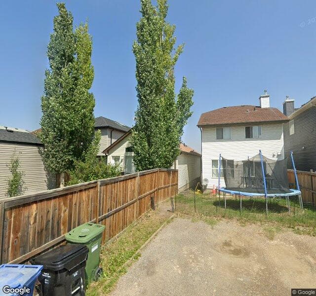Street view of 1693 New Brighton Drive SE, Calgary