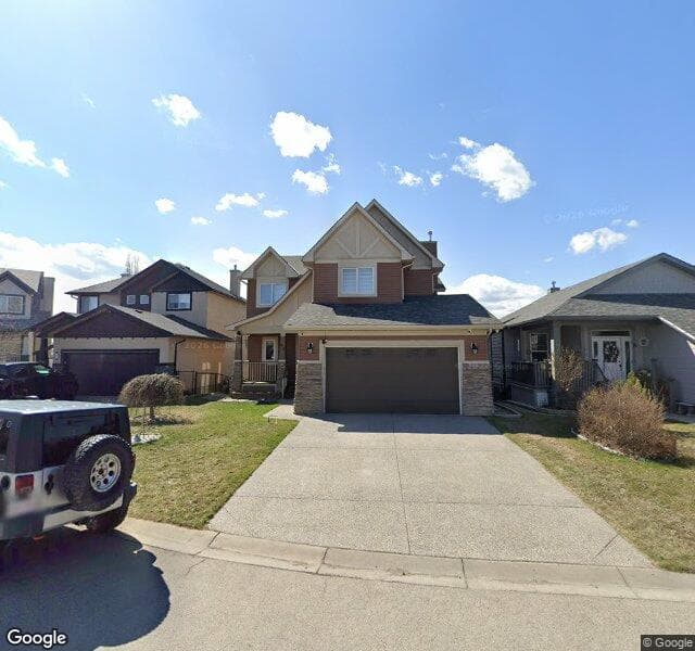 Street view of 83 Hidden Creek Point NW, Calgary
