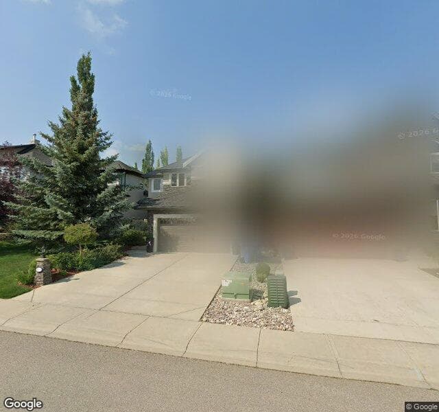Street view of 103 Cougar Plateau Circle SW, Calgary