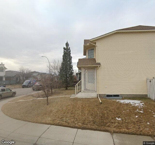 Street view of 104 Rivercrest Circle SE, Calgary