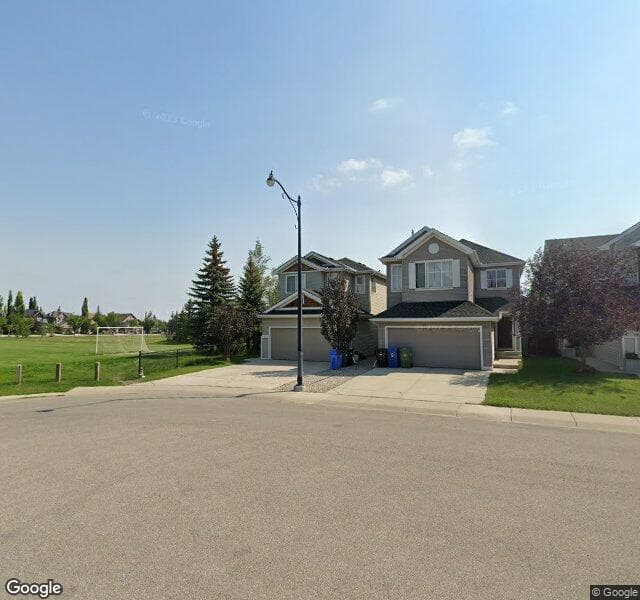 Street view of 32 Cougartown Place SW, Calgary