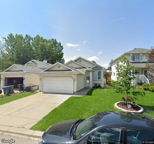 Street view of 83 Douglas Glen Mews SE, Calgary