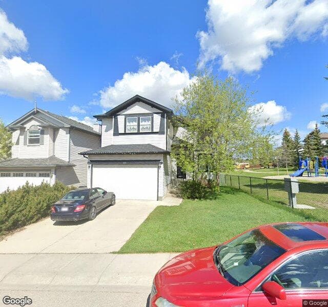 Street view of 105 Rocky Ridge Close NW, Calgary