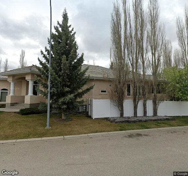 Street view of 100 Evergreen Crescent SW, Calgary