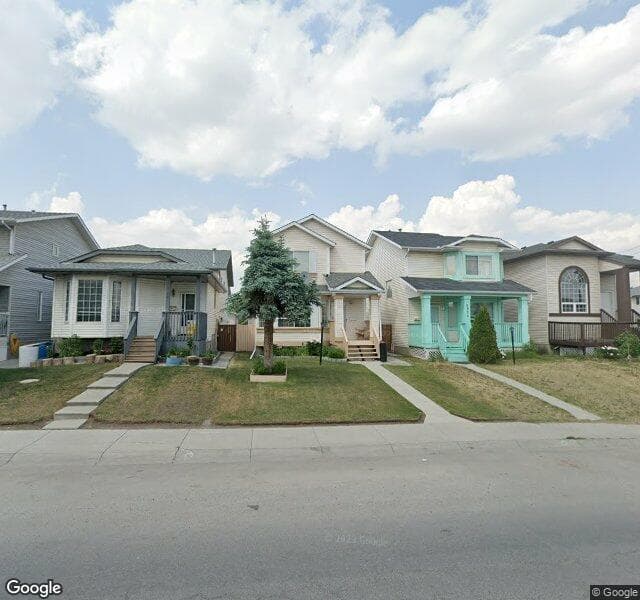 Street view of 6990 Laguna Way NE, Calgary
