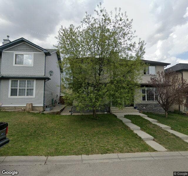 Street view of 57 Covehaven Crescent NE, Calgary
