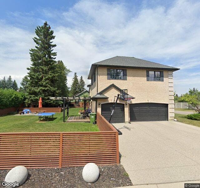Street view of 103 Pumpvalley Court SW, Calgary