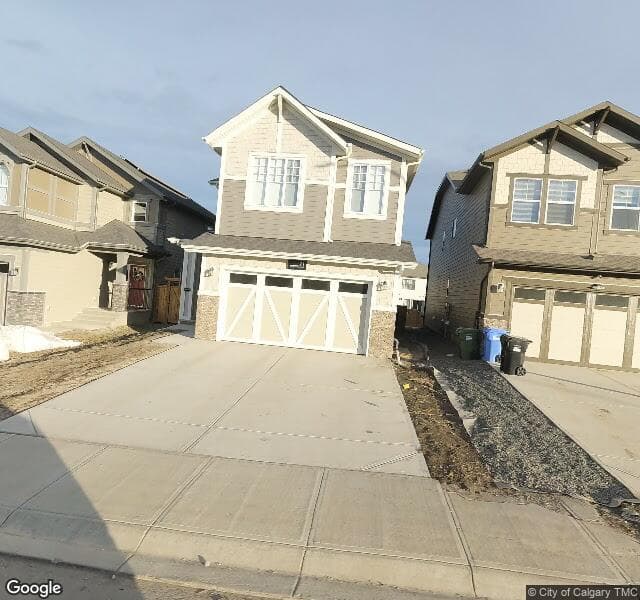 Street view of 21 Magnolia Manor SE, Calgary