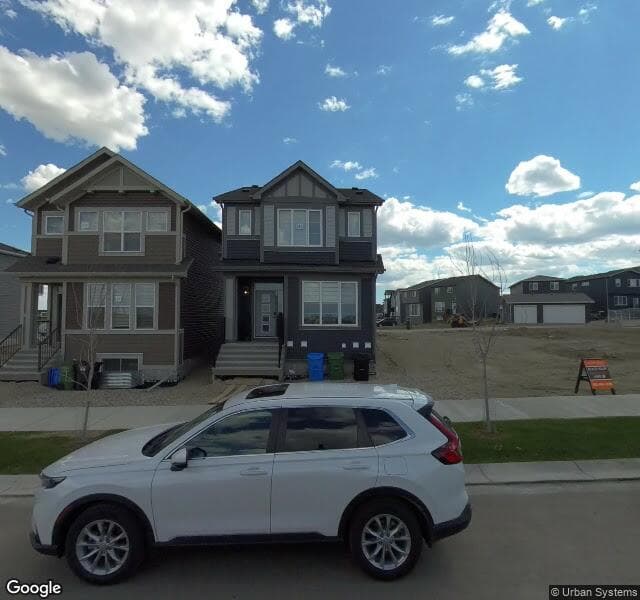 Street view of 223 Lucas Gate NW, Calgary