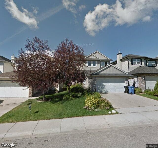 Street view of 58 Rockbluff Close NW, Calgary