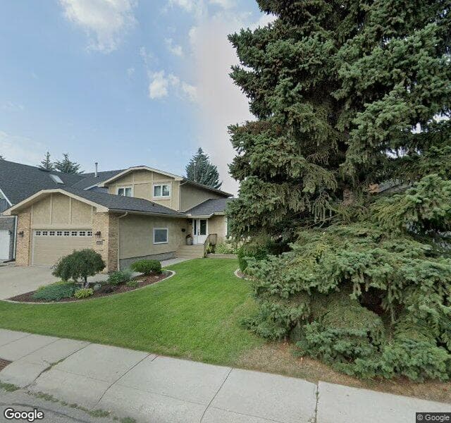 Street view of 47 Woodacres Drive SW, Calgary