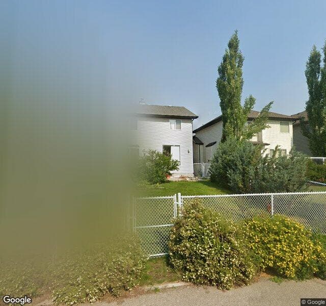 Street view of 211 W Springs Close SW, Calgary