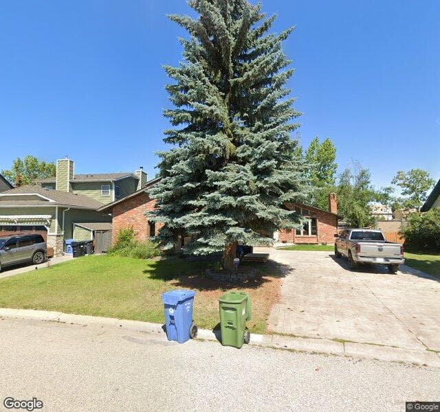 Street view of 72 Strathbury Circle SW, Calgary