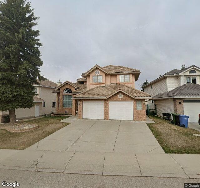 Street view of 59 Woodpark Close SW, Calgary