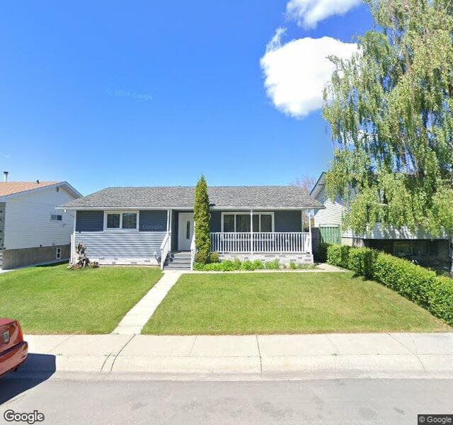 Street view of 823 Rundleside Drive NE, Calgary