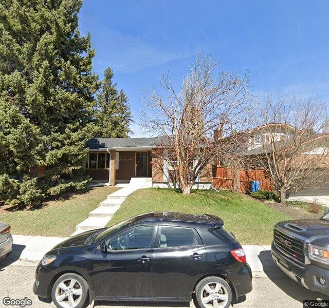 Street view of 1523 Lake Twintree Way SE, Calgary