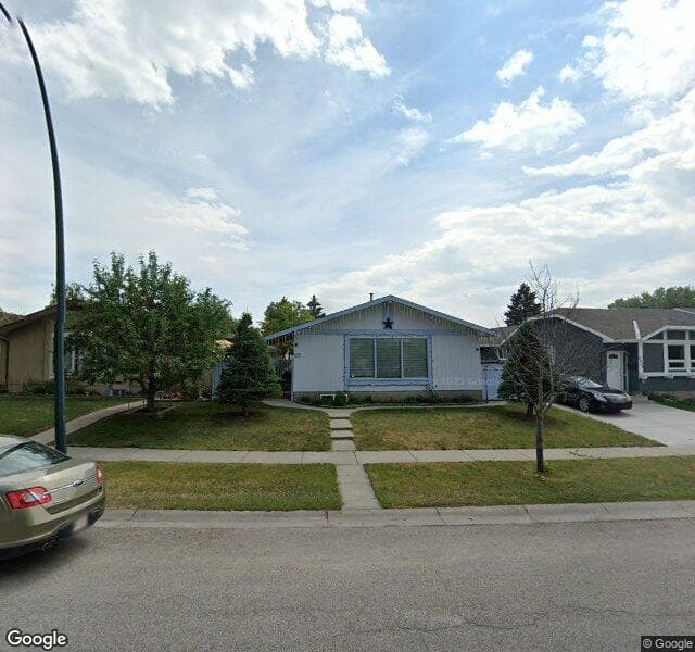 Street view of 6911 4 Avenue NE, Calgary