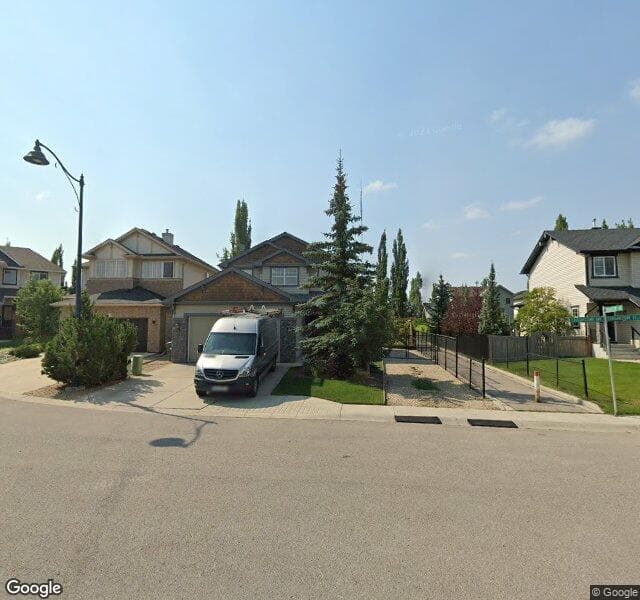 Street view of 34 Cougarstone Bay SW, Calgary