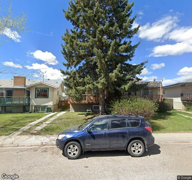 Street view of 6513 58 Street NW, Calgary