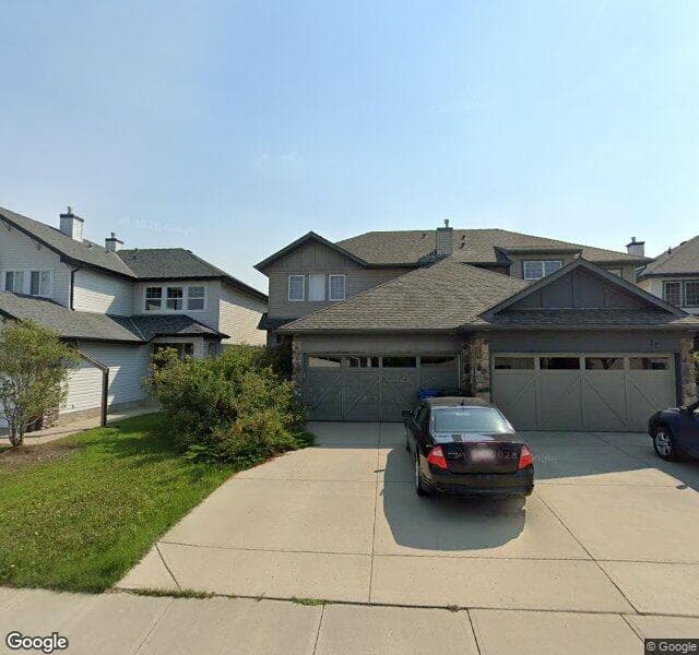 Street view of 81 Cougarstone Place SW, Calgary