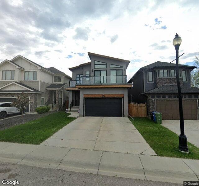 Street view of 307 Tremblant Heights SW, Calgary