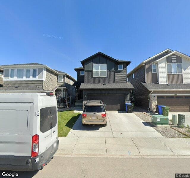 Street view of 50 Creekside Avenue SW, Calgary