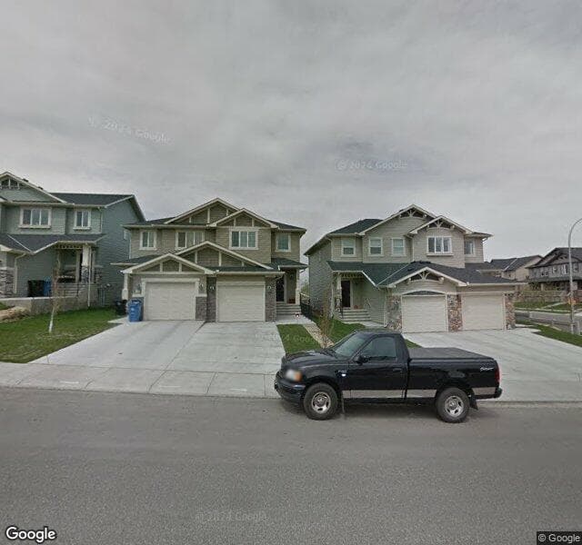 Street view of 542 Panatella Square NW, Calgary