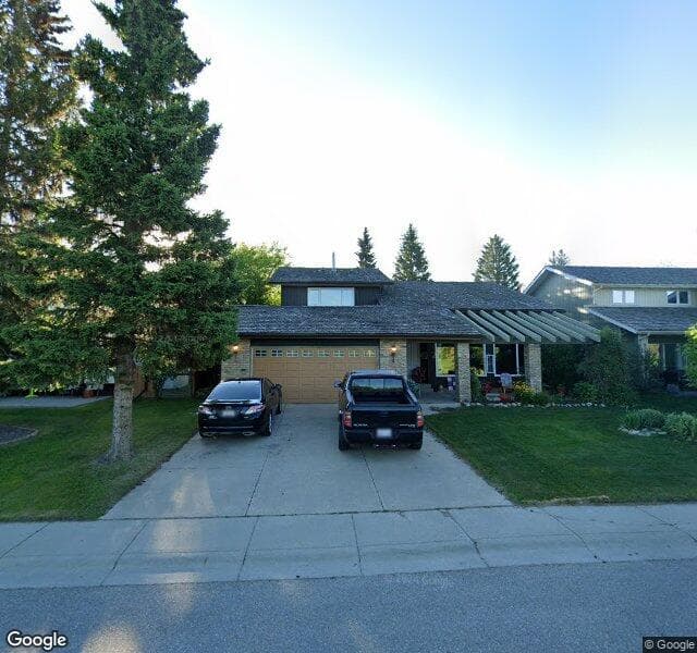 Street view of 9512 Oakmount Drive SW, Calgary
