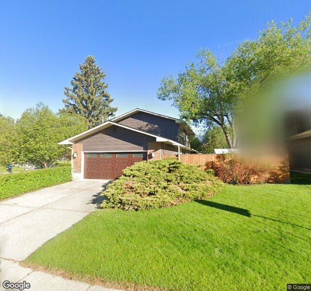 Street view of 2303 Lake Bonavista Drive SE, Calgary