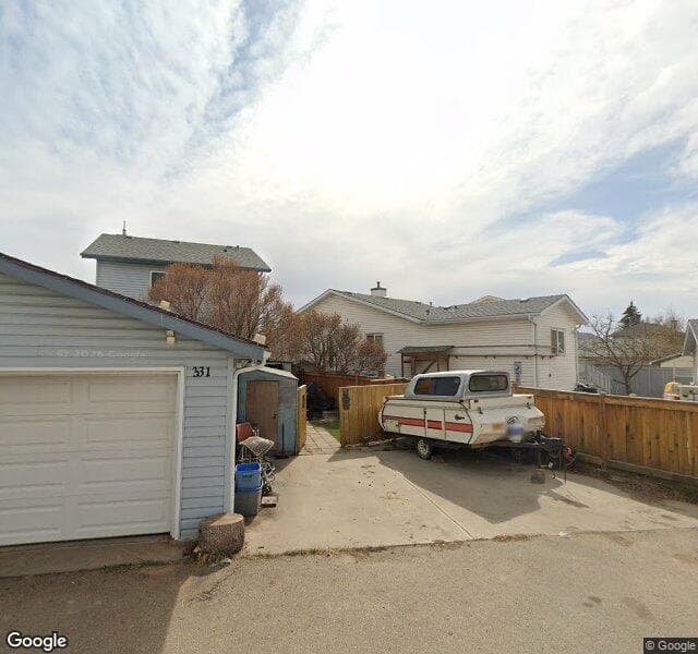 Street view of 327 Covington Bay NE, Calgary