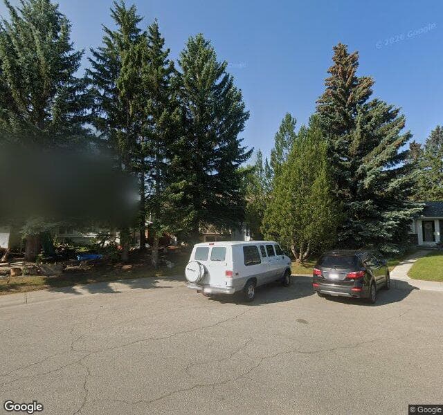 Street view of 811 Lake Emerald Place SE, Calgary