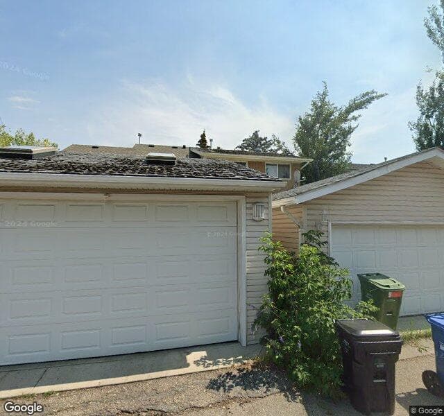 Street view of 543 Woodpark Boulevard SW, Calgary