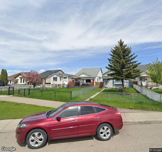 Street view of 8 Erin Meadow Way SE, Calgary