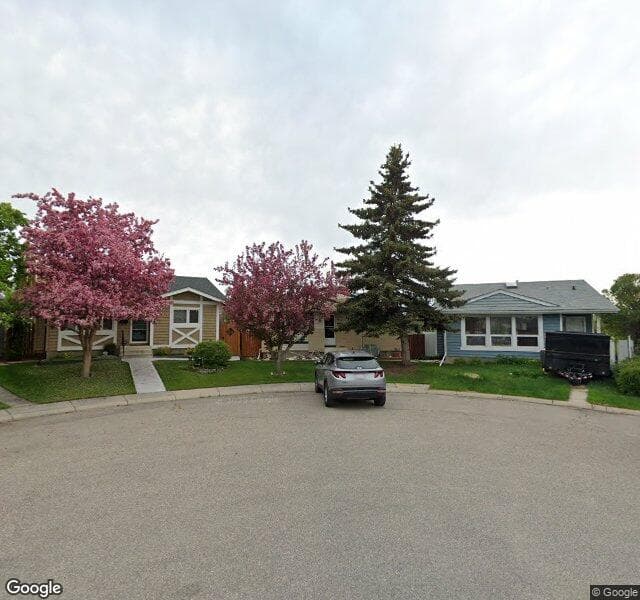 Street view of 56 Shawcliffe Place SW, Calgary