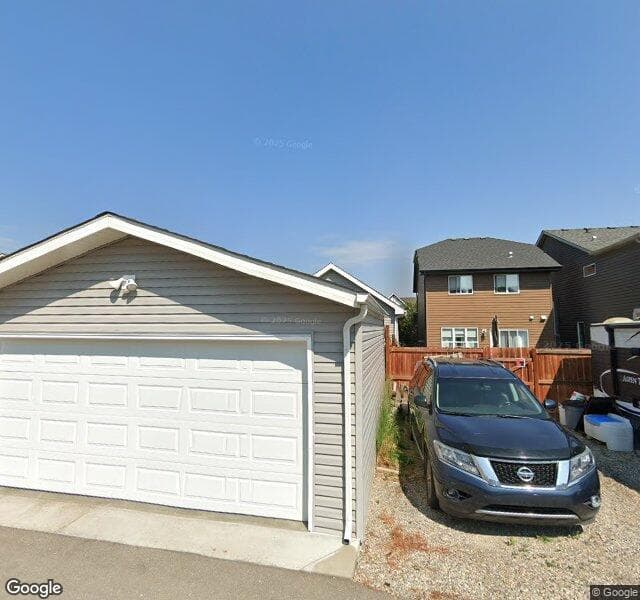 Street view of 54 Auburn Bay Gardens SE, Calgary
