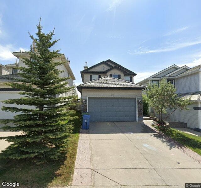 Street view of 153 Spring Crescent SW, Calgary
