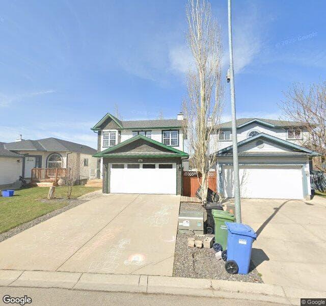 Street view of 163 Hidden Spring Close NW, Calgary