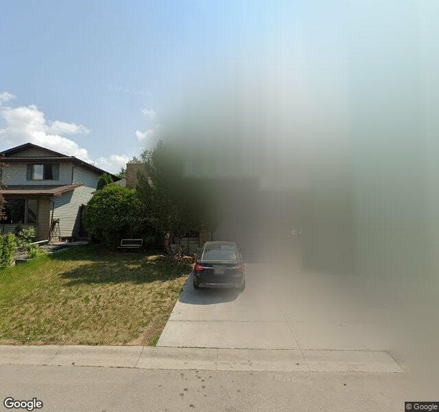 Street view of 15 Castlebury Way NE, Calgary
