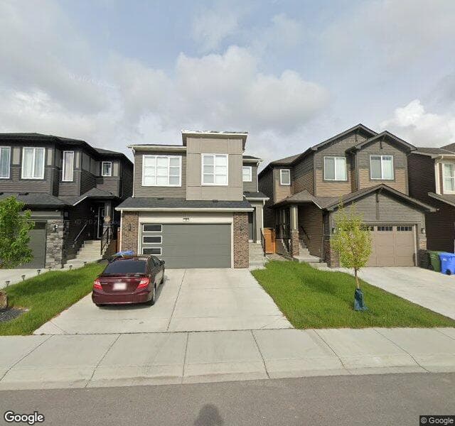 Street view of 96 Sage Bluff Manor NW, Calgary