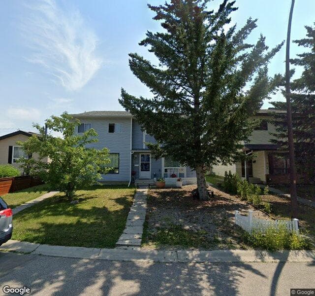 Street view of 216 Cedardale Bay SW, Calgary