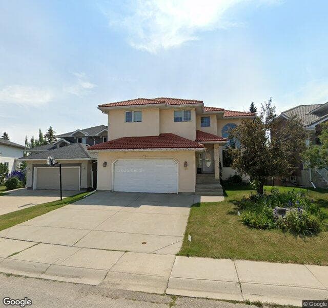 Street view of 99 Woodpark Circle SW, Calgary