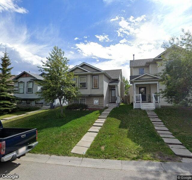 Street view of 115 Covehaven Court NE, Calgary