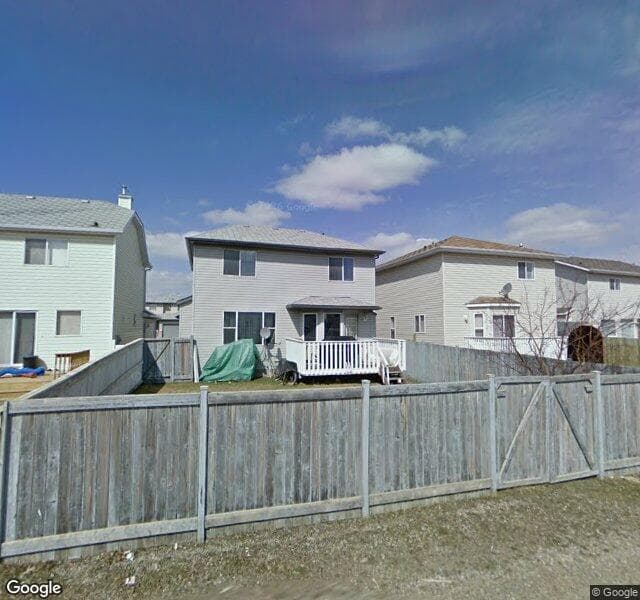 Street view of 579 Harvest Hills Drive NE, Calgary