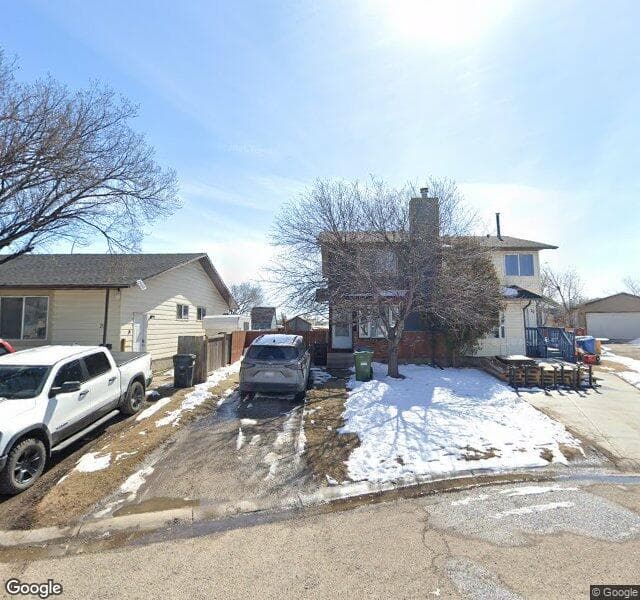 Street view of 77 Castleglen Road NE, Calgary
