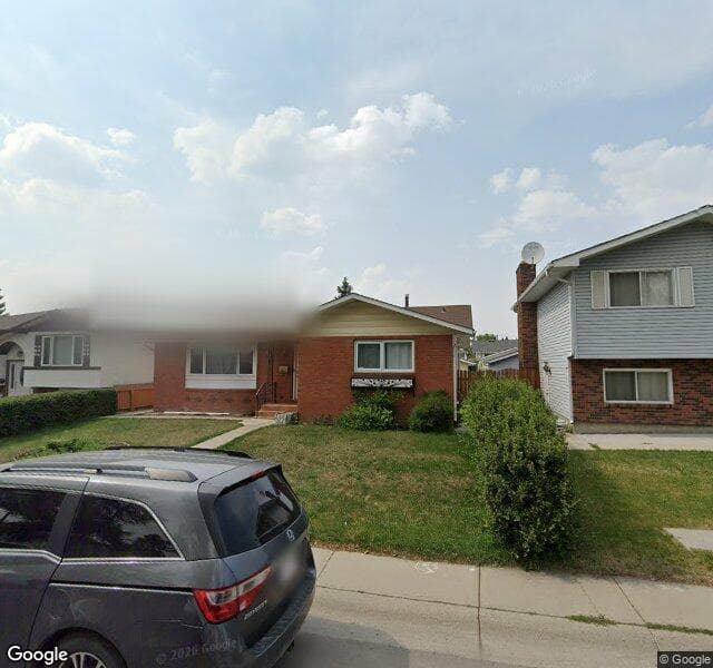 Street view of 963 Rundlecairn Way NE, Calgary