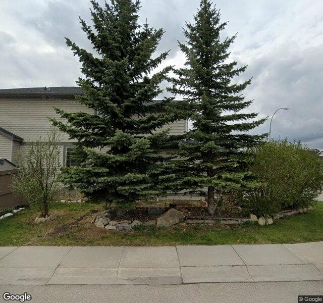 Street view of 407 Bridlewood Avenue SW, Calgary
