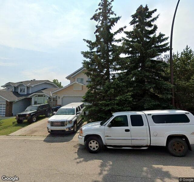 Street view of 55 Woodford Court SW, Calgary