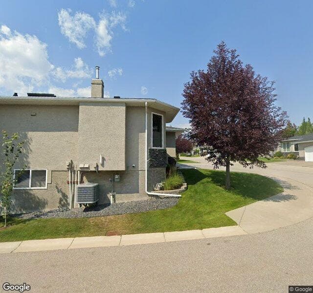 Street view of 71 Elysian Crescent SW, Calgary